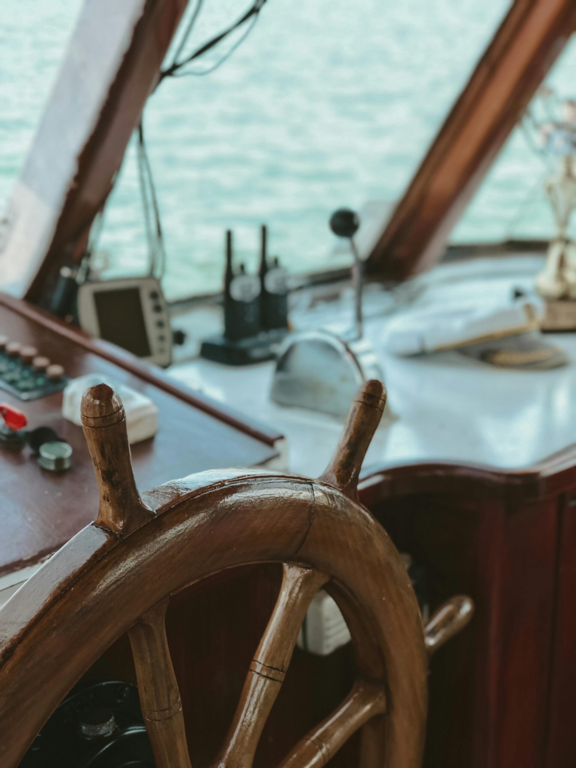 Wooden wheel and navigation tools in a vintage yacht representing bookkeeping salisbury nc